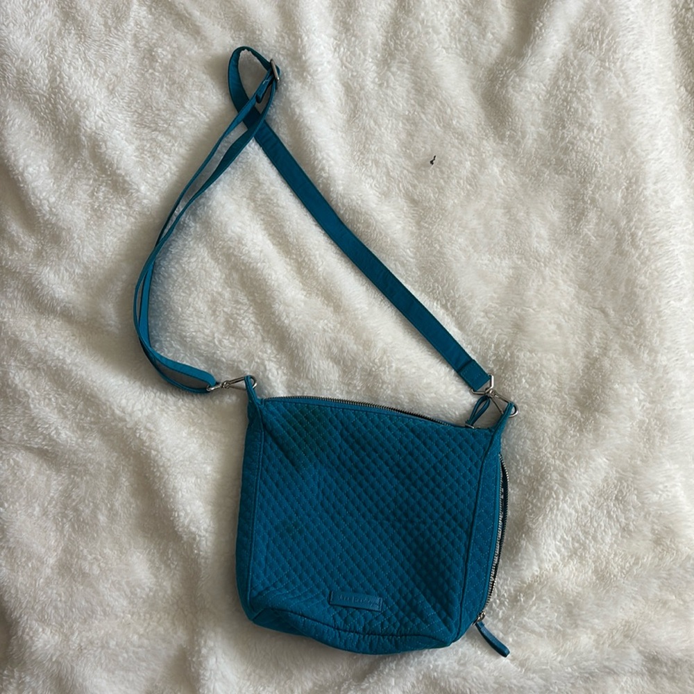Vera Bradley purse with long strap
Jewel Blue
Side and inside zip pocket,